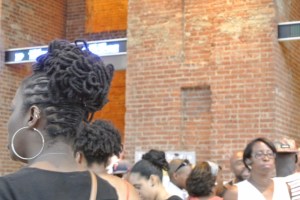 Locks were styled in intricate updos.