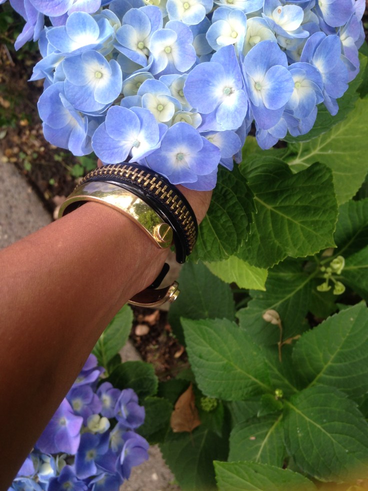 Pretty, gold tone, bracelets. One from CWonder and the other, I'm not sure.